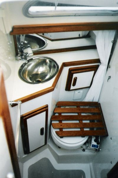 Your typical sailboat head (bathroom), complete with sink, vanity 